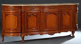 French Louis XV Style Carved Cherry Marble Top Sideboard, 20th c., the thick rounded edge highly figured ocher marble over two setback concave frieze 