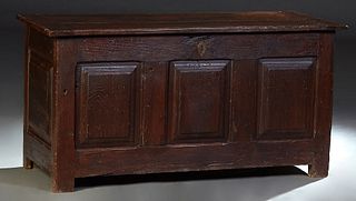 Large French Provincial Carved Oak Coffer, early 19th c., stepped rectangular top over a front with three rectangular fielded panels, on block legs, H