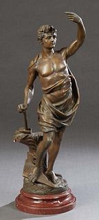 After Emile Bruchon (1806-1895, French), "Gloire du Travail," late 19th c., bronze patinated spelter, with an incised signature under the figure's foo
