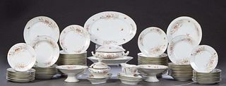 Seventy-Nine Piece French Partial Porcelain Set of Dinnerware, 20th c., probably Limoges, with gilt rims and hand painted gilt, butterfly and floral d
