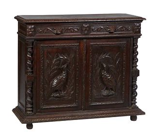 French Provincial Henri II Style Carved Oak Server, c. 1880, the stepped carved edge top opening to an inset white marble top over two frieze drawers 