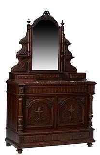 French Henri II Style Carved Walnut Marble Top Dresser, c. 1880, the arched wide beveled mirror with a pierced ribbon crest, flanked by graduated cand