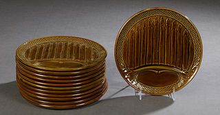 Set of Twelve French Majolica Asparagus Plates, late 19th c., with relief decoration, H.- 1/2 in., Dia.- 9 3/4 in.