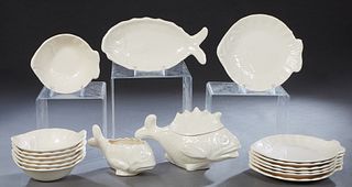 Seventeen Piece French Ceramic Fish Set, early 20th c., consisting of 7 fish form plates, 7 fish form bowls, a fish form platter, a covered fish form 