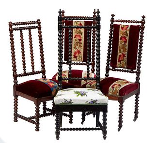 Set of Four French Louis XIII Style Carved Walnut Side Chairs, 19th c., with bobbin turned spindled cushioned backs to trapezoidal cushioned seats, tw