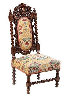 French Henri II Style Carved Oak Side Chair, c. 1880, the arched pierced dragon form crest atop a canted oval cushioned back, flanked by rope twist su