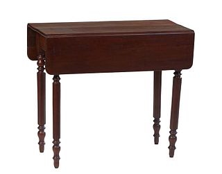 French Louis Philippe Carved Walnut Drop Leaf Tea Table, 19th c., the rounded edge leaves over a wide skirt, on turned tapered reeded cylindrical legs