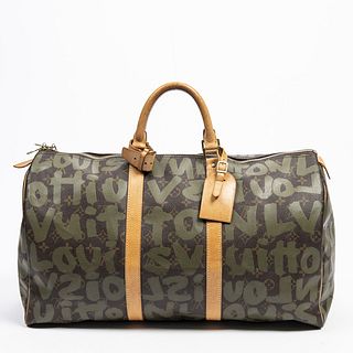 Louis Vuitton Limited Edition Stephen Sprouse Graffiti Keepall 50 Travel Bag, in monogram graffiti coated canvas with golden brass hardware, opening t