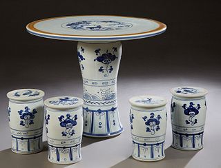 Chinese Porcelain Five Piece Patio Set, 20th c., consisting of a circular table with deer and bird decoration and four cylindrical stools, H.- 29 1/4 