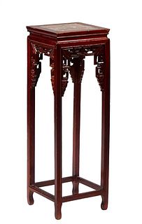 Chinese Carved Mahogany Marble Top Plant Stand, 20th c., the inset figured brown marble stepped top with pierced skirts, on square legs with pierced s
