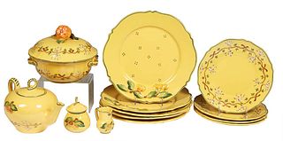 Thirteen Piece Partial Set of French Provincial Faience Dinnerware , 20th c., by Faiencerie d'Art de Malicorne, in bright yellow with hand painted gre