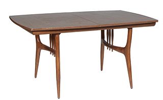 American Mid Century Modern Mahogany Dining Table, c. 1950, by Walter Wabash, the rounded edge top on cylindrical splayed tapered legs, with one leaf,