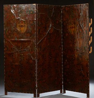 Large English Three Panel Leather Screen, late 19th c., with painted armorial decoration, two panel mounted with a rear four slot rifle rack, Each Pan