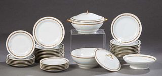 Thirty-Five Piece Partial Set of French Porcelain Dinnerware, c. 1895, by CS & C, with gilt edges and gilt tracery banding, consisting of 11 salad pla
