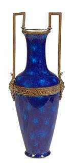 Large Bronze Mounted Sevres Porcelain Baluster Urn, post 1911, by Paul Millet, with a bronze rim issuing the squared bronze handle, over a relief deco