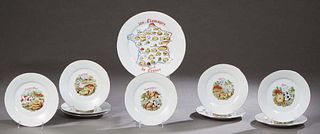 Ten Piece Limoges Porcelain Cheese Set, 20th c., "Les Fromages de France," with nine circular plates with various humorous transfers of different chee