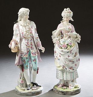 Pair of Large German Style Porcelain Figures, 20th c., of a man and a lady in 18th c., dress, on integral circular bases, marked M-660 on the undersid
