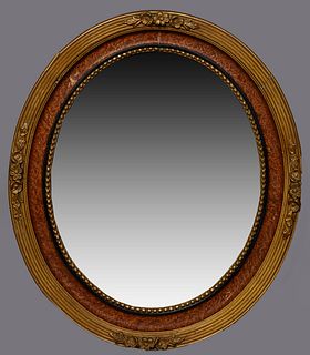 French Gilt and Gesso Louis XVI Style Overmantel Mirror, 20th c., the reeded frame with relief floral decoration on all sides, around a faux bois band