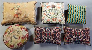 Group of Six Throw Pillows, 20th c., two made from an oriental carpet; three needlepoint examples; and one crocheted example. Largest- H.- 15 in., W.-