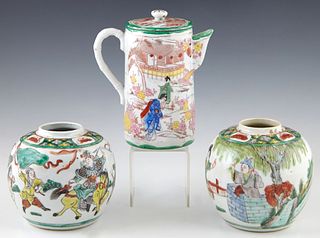 Group of Three Pieces of Chinese Porcelain, 19th c., with figural and landscape decoration, consisting of a lidded teapot and two baluster ginger jars