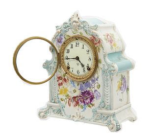 Ansonia Porcelain mantle clock "La Mosella" Ansonia chiming porcelain mantle clock "La Mosella"
Not tested, (as is) condition
Approx 12"H X 11" W X 