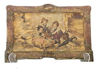 Early 20th century framed cast wall plaque Early 20th century framed cast wall plaque depicting children playing with puppets 
Approx 12h" x 9w" 