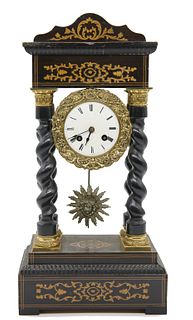 19th century French Napoleon III clock 19th century French Napoleon III chiming clock with wood carved columns
Approx 18" x 9" x 5"  
Not tested, (a