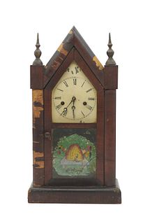 American 19th century New Haven clock co. American 19th century New Haven clock co. Steeple chiming clock with eglomise painting of beehive on glass
