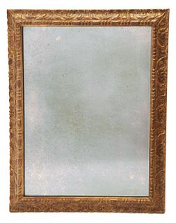 17th century Italian style Mirror 17th century Italian style carved and gilt wood frame with antique glass mirror.
Approx overall size 47" x 38"