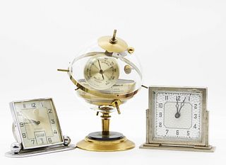 Assorted lot two clocks and one barometer Miscellaneous assorted lot three clocks and barometer, one Muller & co. Made in Germany, one Lux clock co. U