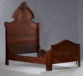 French Provincial Carved Oak Ladderback Armchair, 19th c., the finial topped turned and block supports enclosing three pierce