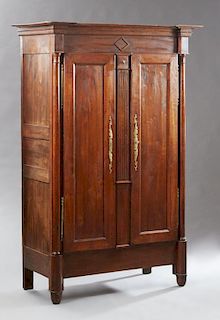 French Louis Philippe Carved Mahogany Armoire, 19th c., the arched stepped crown above a wide arched mirror door, over a "sec