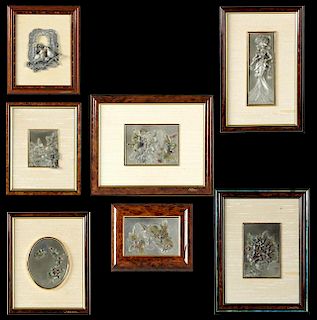 Group of Seven French Pewter Relief Pieces, 20th c