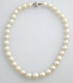 Strand of 35 White Graduated South Seas Pearls, 11