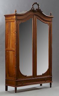 French Louis XVI Style Carved Walnut Armoire, late