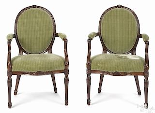 Pair of George III carved mahogany armchairs, late 18th c.