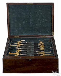 Set of stag handled utensils, 19th c., in a fitted mahogany case with a plaque