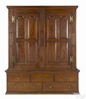 Pennsylvania tiger maple two-part schrank, ca. 1780, probably Chester County