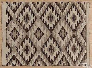 Navajo weaving, early 20th c., 67'' x 49''.