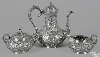 S. Kirk & Sons three-piece sterling silver tea service, to include a teapot, 9 3/4'' h., a creamer