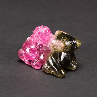 A GREEN AND PINK TOURMALINE CARVING OF BUFFALO 