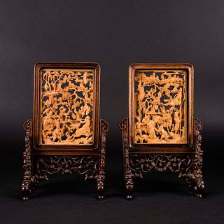 A PAIR OF CARVED HUANGYANG WOOD 'FIGURAL' TABLE SCREENS 