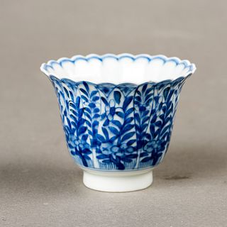 A BLUE AND WHITE CUP