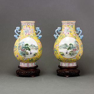 A PAIR OF FAMILLE ROSE YELLOW GROUND 'LANDSCAPE' VASE