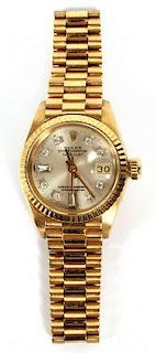 ROLEX OYSTER PERPETUAL DATE JUST 18 KT GOLD WATCH