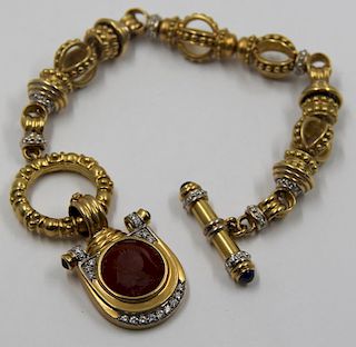 JEWELRY. 18kt Gold Toggle Clasp Bracelet and Charm