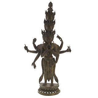 Large Himalayan gilt metal figure of a Deity