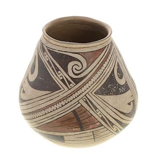 A Native American wide-bellied pottery vessel