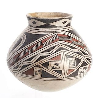 A Native American wide-bellied pottery vessel