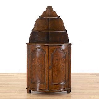 Continental figured walnut corner cabinet